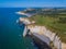 Aerial drone photo of the pointed formation called L`Aiguille or the Needle and Porte d`Aval at Etretat, north western