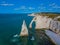 Aerial drone photo of the pointed formation called L`Aiguille or the Needle and Porte d`Aval at Etretat, north western