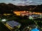 Aerial Drone Photo - Resort hotels along the Pacific coast of Costa Rica, surrounded by rugged mountains