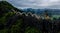 Aerial drone photo - Woman next to a dragon shrine atop a mountain in northern Vietnam.  Hang Mua