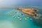 Aerial drone photograph of watersport boats moored anchored at the sea. Summer holidays