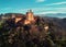 Aerial drone point of view Granada castle and surrounding lands meadows, Alhambra or Red Castle