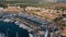 Aerial drone point of view Port Adriano docked yachts vessels in row, sunny summer day