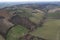 aerial drone scenic of hills, vineyards and farms in Martani near Castell'Arquato in Arda Valley, Italy.