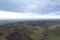 aerial drone scenic of hills, vineyards and farms in Martani near Castell'Arquato in Arda Valley, Italy.