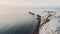 Aerial Drone Shot of Beautiful UK Coastal Scenery and Lighthouse, Isle of Wight, The Needles Chalk C
