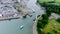 Aerial drone shot of Caernarfon Castle, North Wales United kingdom. boat leaving dock area