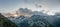 Aerial drone shot of clouds over the mountain at Schlegeisspeicher reservoir during sunset