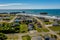 Aerial drone shot of coastal homes on bluff in Bandon, Oregon.