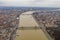 Aerial drone shot of Danube river in cloudy Budapest winter morning