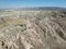 Aerial drone shot of the Fairy Chimneys over the landscape of Goreme, Cappadocia.