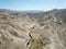 Aerial drone shot of the Fairy Chimneys over the landscape of Goreme, Cappadocia.