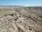 Aerial drone shot of the Fairy Chimneys over the landscape of Goreme, Cappadocia.