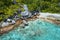 Aerial drone shot of grand L Anse remote tropical beach at La digue, Seychelles