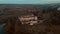 Aerial drone shot of historic castle on hill near lake, medieval architecture and cultural landmark in rural Svirzh