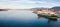 Aerial drone shot of a industrial shipyard and cargo ship loading port with cargo ships in Vancouver, BC, Canada.