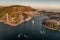 Aerial drone shot of Lapad Gruz peninsula area with Dubrovnik bridge cruise ship in Croatia summer sunset