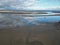 Aerial drone shot of a shallow river with reflections in Appledore village, North Devon, England