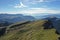 Aerial drone shot of the sharp mountains and cliffs