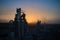 Aerial drone shot. Silhouette cement plant with high factory structure at industrial production area at sunset. Version