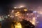 aerial drone shot skyscraper buildings in gurgaon delhi in dense fog smog pollution showing the lavish lifestyle and bad