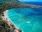 Aerial drone shot view of beach in Hanauma Bay Nature Reserve in Hawaii