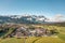 Aerial drone shot of village Garmisch Partenkirchen with view of Zugspitze in fog