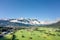 Aerial drone shot of village Garmisch Partenkirchen with view of Zugspitze in fog