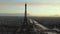 AERIAL: Drone Slowly Circling Eiffel Tower, Tour Eiffel in Paris, France with view on Seine River in Beautiful Sunset