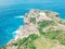 Aerial drone top view of coral beach and blue ocean waves In Nusa Penida, Bali, Indonesia. Overhead View Of Rocky Coast And Coves