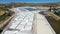 Aerial drone top view of natural salt ponds.