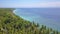 Aerial drone on on tropical paradise island of Asia with palm trees vegetation coastline jungle with an amazing beautiful sea wat