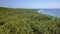 Aerial drone on on tropical paradise island of Asia with palm trees vegetation coastline jungle with an amazing beautiful sea wat