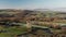 Aerial drone video of Broadway Tower, a famous old building landmark in The Cotswolds Hills, iconic