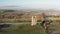 Aerial drone video of Broadway Tower, a famous old building landmark in The Cotswolds Hills, iconic