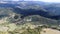 Aerial drone view of ATV quads on a dirt trail in forests. Off-road group team club enthusiasts having fun while driving