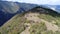 Aerial drone view of ATV quads on a dirt trail in forests. Off-road group team club enthusiasts having fun while driving