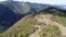 Aerial drone view of ATV quads on a dirt trail in forests. Off-road group team club enthusiasts having fun while driving