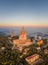 Aerial drone view of Basilica Sacred Heart on Mount Tibidabo near Barcelona during sunset golden hour