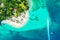 Aerial drone view of beautiful caribbean tropical island Cayo Levantado beach with palms and boat. Bacardi Island, Dominican