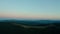 Aerial drone view a beautiful evening in the mountains with the moon. Wide shot