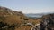 Aerial drone view of beautiful natural landscape. Tourists at Mirador Es Colomer viewpoint. Popular tourist destination