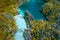 Aerial drone view of a beautiful tropical Big Lagoon at Miniloc Island, El Nido, Philippines. Tourist kayaking