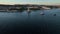 Aerial drone view of Belem Tower on the bank of the Tagus River at sunset. Lisbon, Portugal