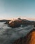 Aerial drone view of Bromo crater Mountain, East Java, Indonesia. man standing on the edge of Bromo crater, high