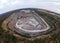 Aerial drone view of career in Europe, crushed stone quarry at summer sunset