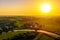 Aerial drone view of the church of Elijah the Prophet at the Kamenka river, Russia. Summer sunny day sunset