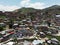 Aerial drone view of the cityscape of Medellin with graffiti on the walls of buildings