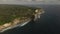 Aerial drone view of cliffs at Uluwatu Bali Indonesia, wild beaches, lagoons