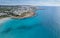 Aerial drone view of the coastline of empty beach in winter. Summer holidays. Nissi beach Ayia Napa, Cyprus